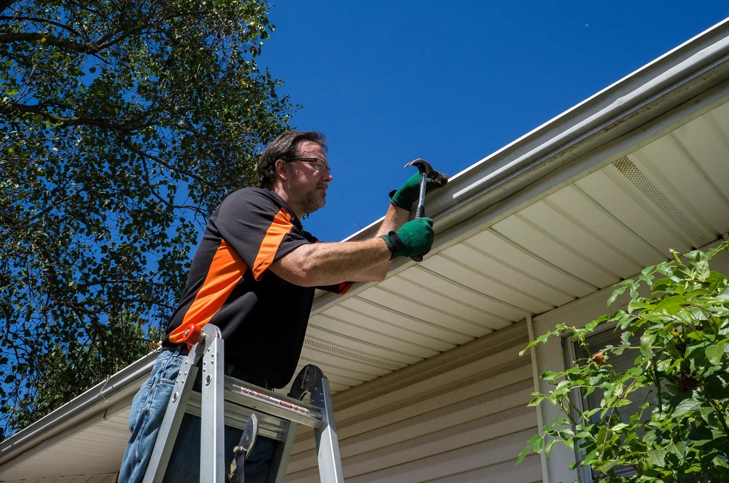 What is the slope of gutter drainage?